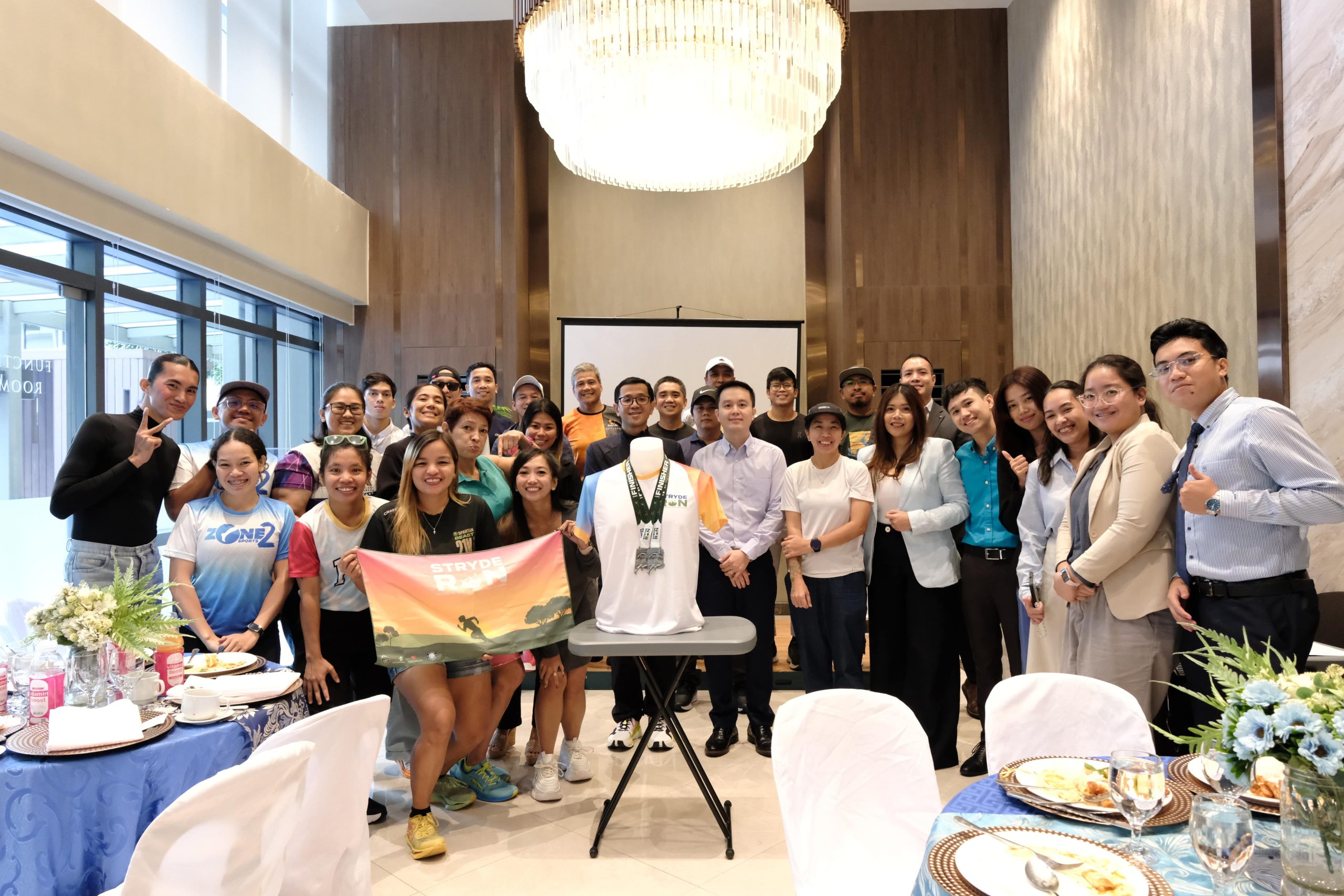 Group picture of different organizing teams for Stryde Run